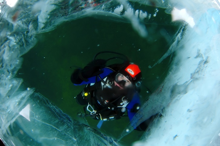 Ice divers at Lake Baikal