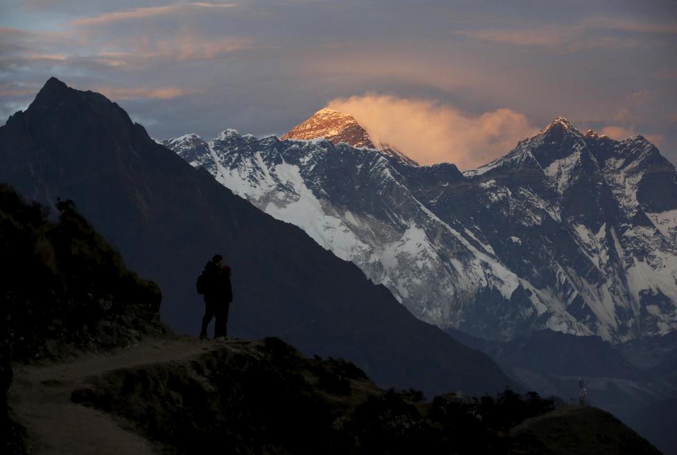 Light illuminates Mount Everest during sunset in Solukhumbu district also known as the Everest region