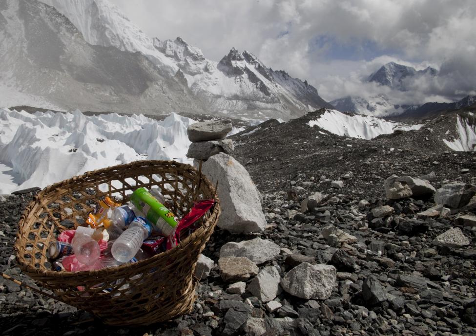 Rubbish collected at Everest base camp with the Himalayan range seen at the background in Nepal